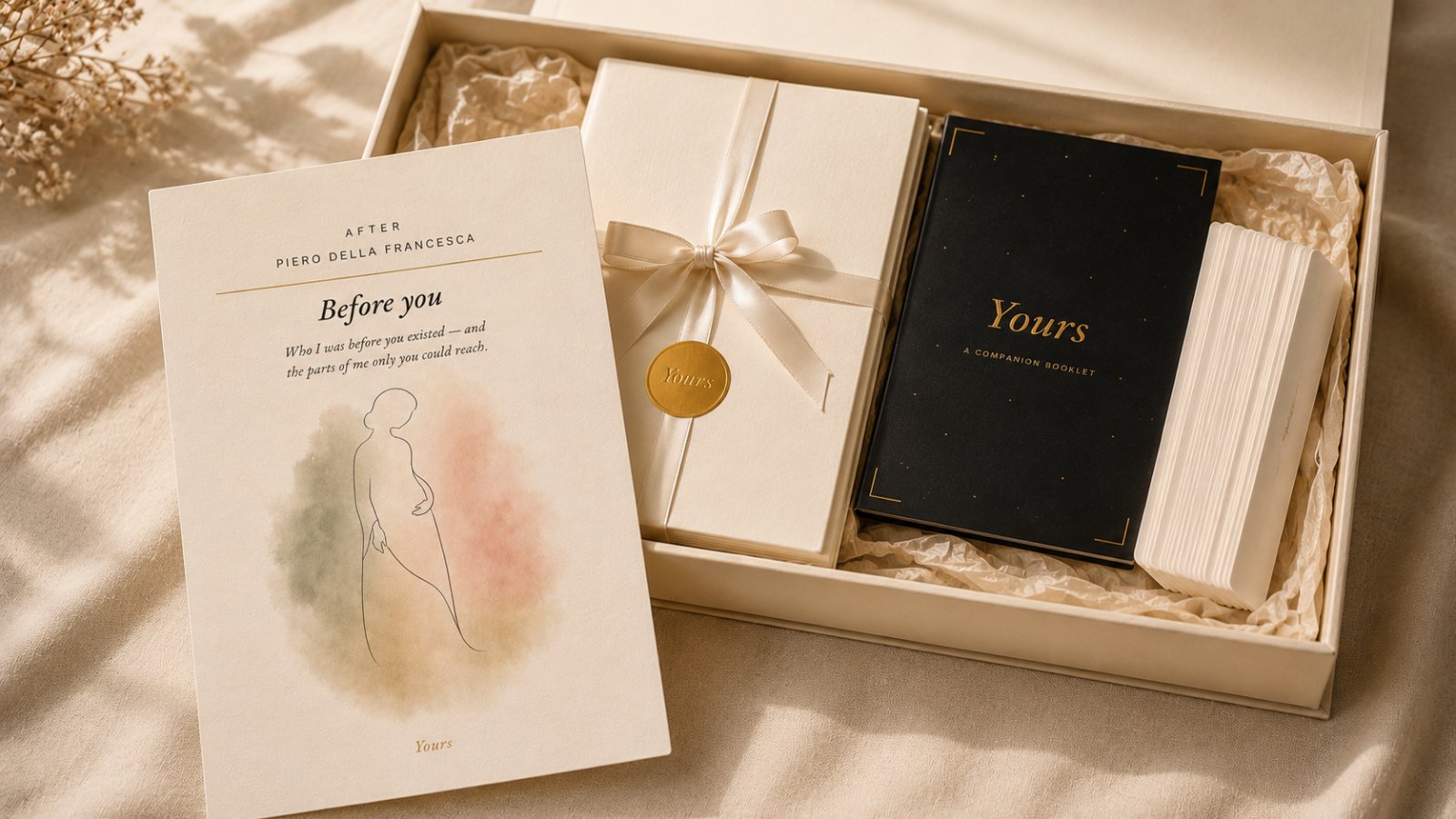 A Book of Letters — the open keepsake box showing the 'Before you' painting card after Piero della Francesca, the gift-wrapped cards sealed in gold, and the companion booklet